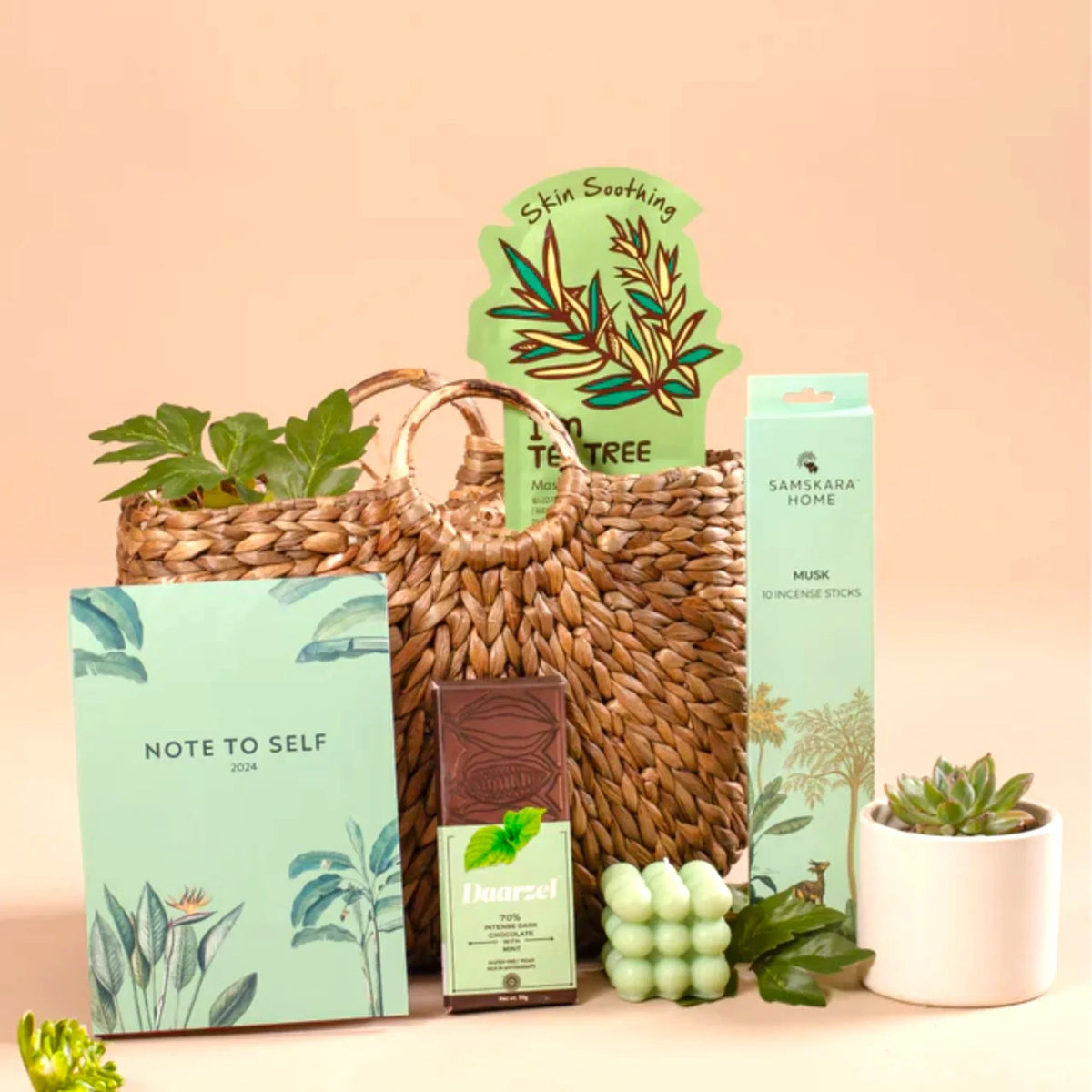 Eco-friendly gift basket with skincare, chocolate, incense, and planner