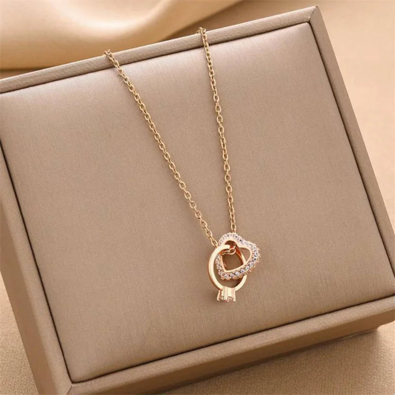 Lovers Embrace Pendant Jewelry with elegant heart design and sparkling diamond accents, ideal for Valentine's Day and romantic gifts.