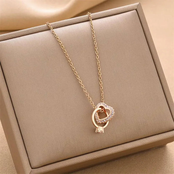 Lovers Embrace Pendant Jewelry with elegant heart design and sparkling diamond accents, ideal for Valentine's Day and romantic gifts.