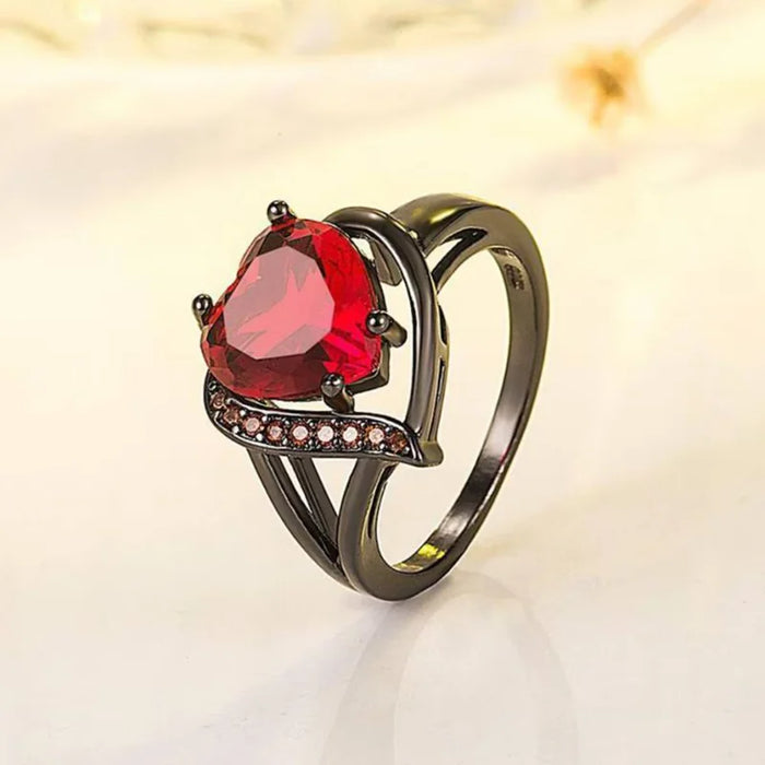 Scarlet Love Ring featuring a heart-shaped red CZ stone on a rhodium-plated brass band, perfect for Valentine’s Day or promise gifts.