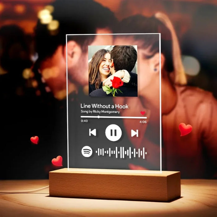 Lyrics Photo Frame - Personalized LED Photo Frame with custom image and Spotify code, ideal for Valentine's Day or romantic events. Features 'Line Without a Hook' song display on 6x9 inch acrylic with wooden LED base.