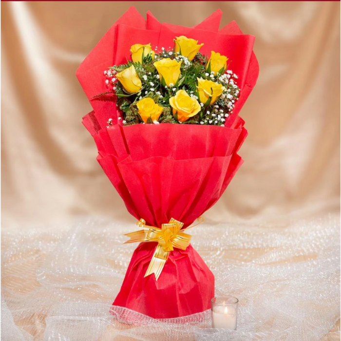 Yellow roses bouquet with red wrapping