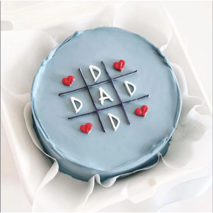 Blue birthday cake with hearts and 'Dad' message