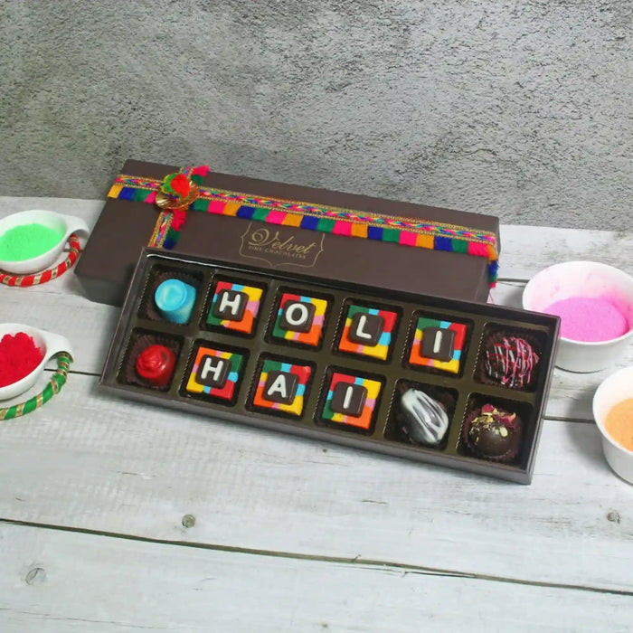 Holi Hai Chocolates Box with colorful chocolates spelling 'HOLI HAI' for celebration