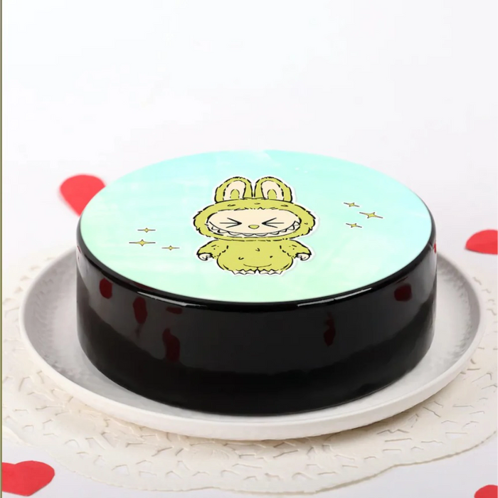 Cute cartoon lion face on round cake with hearts