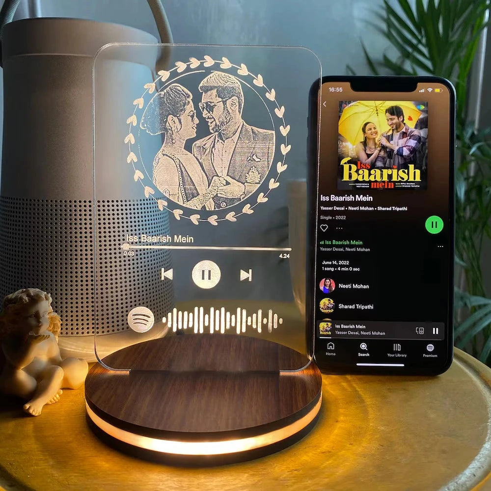 Engraved LED couple lamp gift with personalized photo and Spotify code, glowing warmly on a wooden base, ideal for romantic home décor.