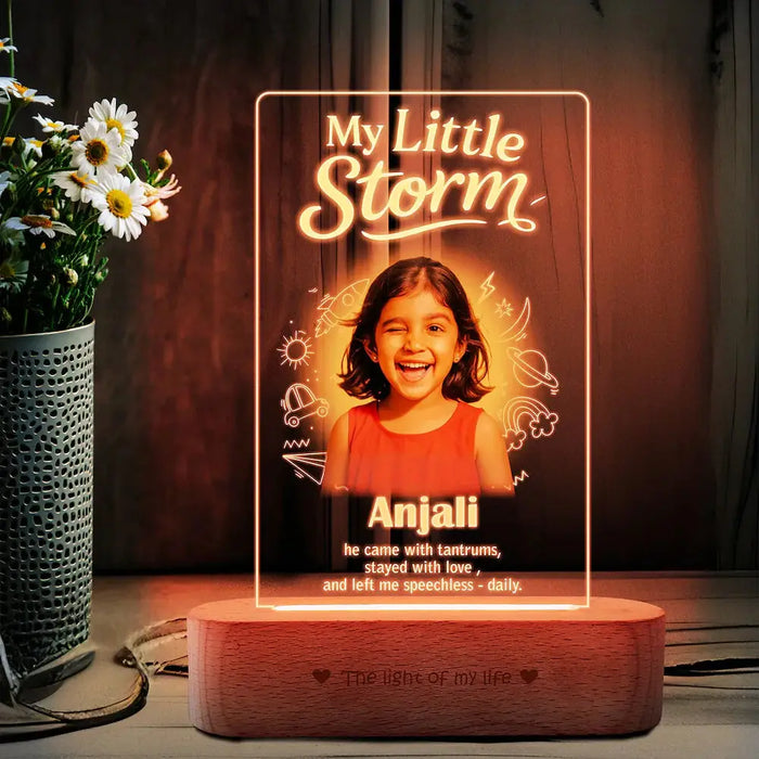 Personalized Girl Photo Frame - Custom Gift for Sister with LED glow, featuring a smiling girl named Anjali on a wooden base, ideal for decor.