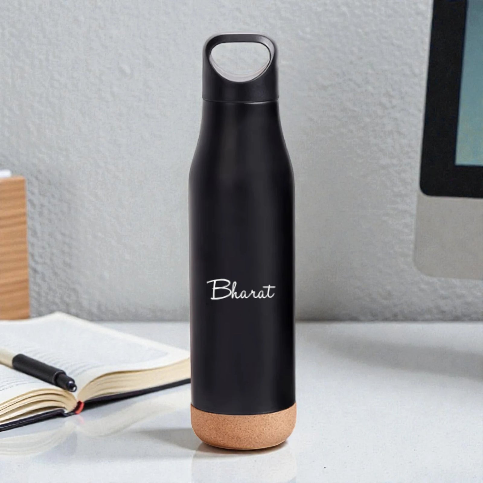 bottle standing on table Personalized black metal water bottle sleek durable daily essential and personalized gifts for boyfriend