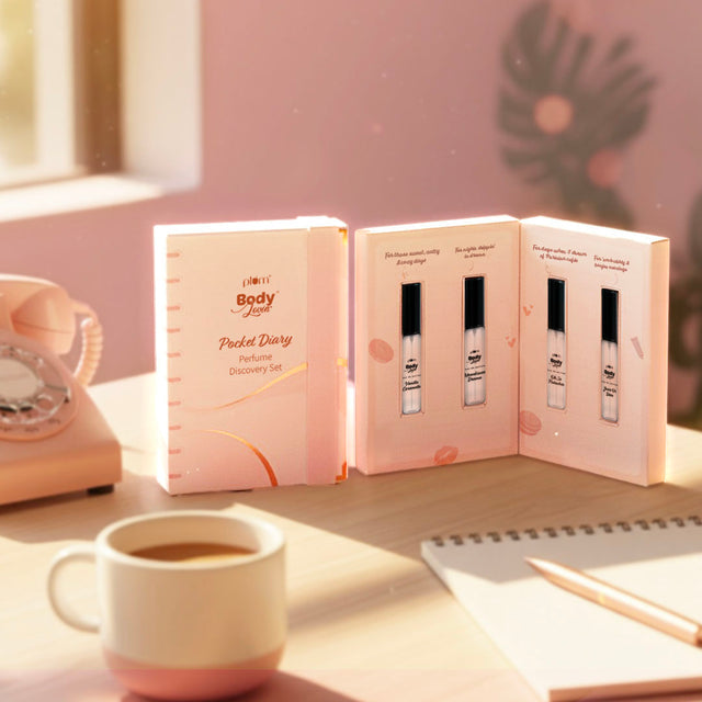 Pocket Diary Perfume Discovery Set with four mini fragrances displayed in a book-style case, ideal for travel and gifting.