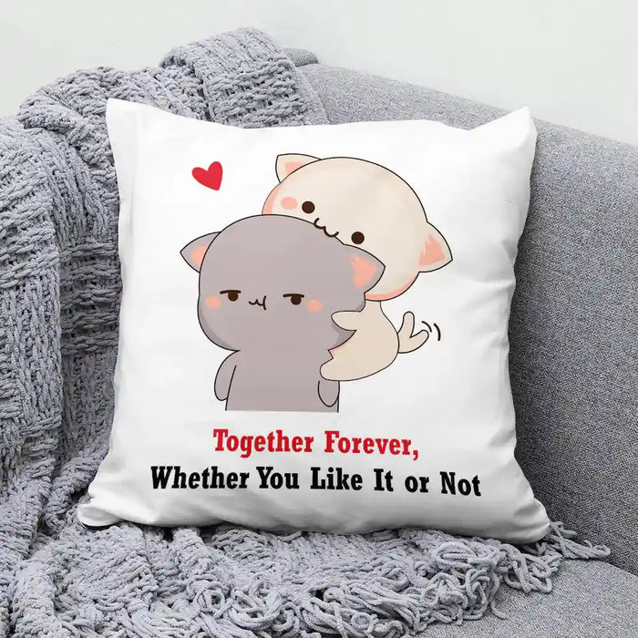 Valentines Cushion Gift - Together Forever featuring cute cartoon cats hugging with heart, placed on a grey knitted throw blanket. Ideal for home décor.
