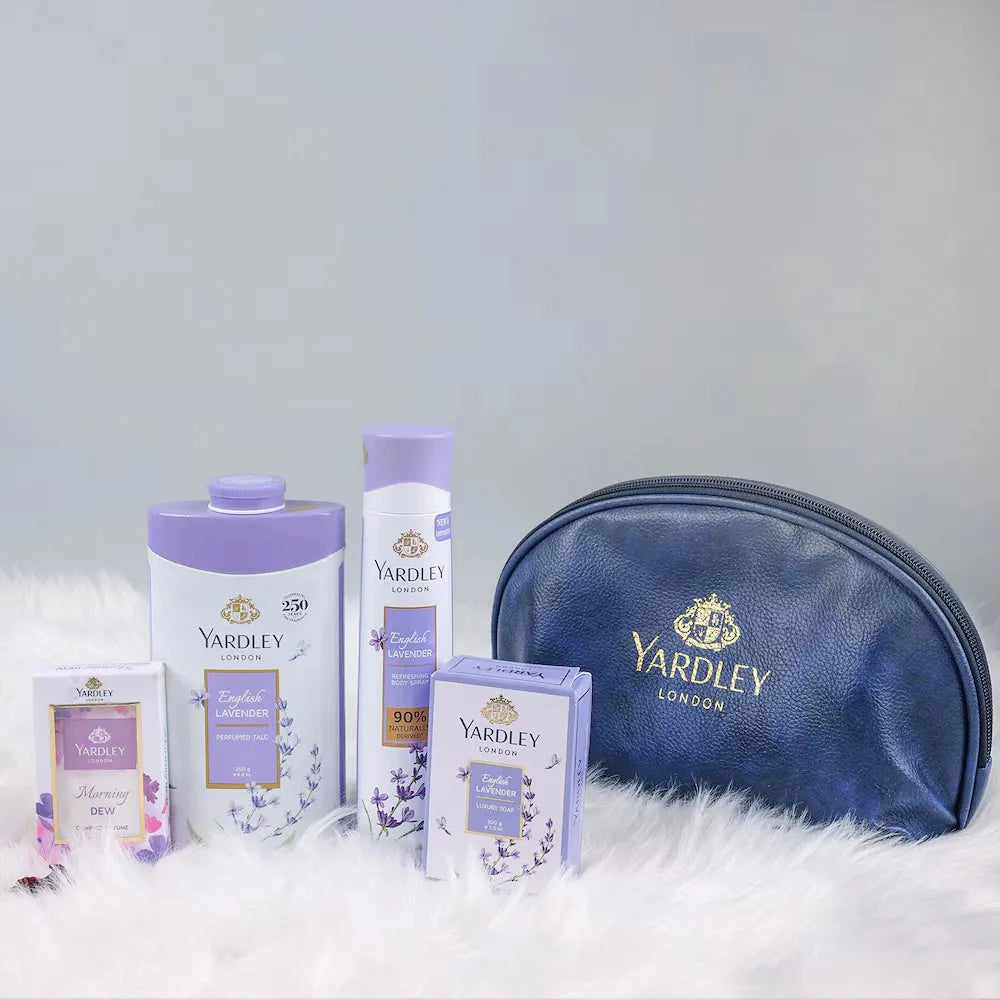 Yardley English Lavender Gifts for Women featuring compact perfume, talc, body spray, soap, and a blue cosmetic pouch on white fur.